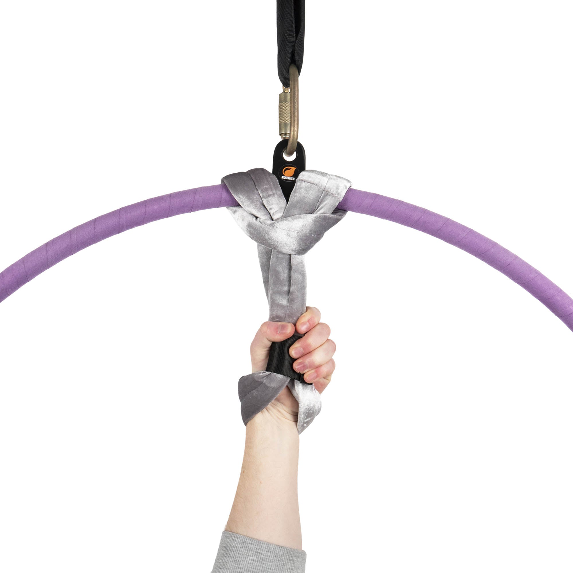 Silver velvet hand loop attached to one point aerial hoop in hand