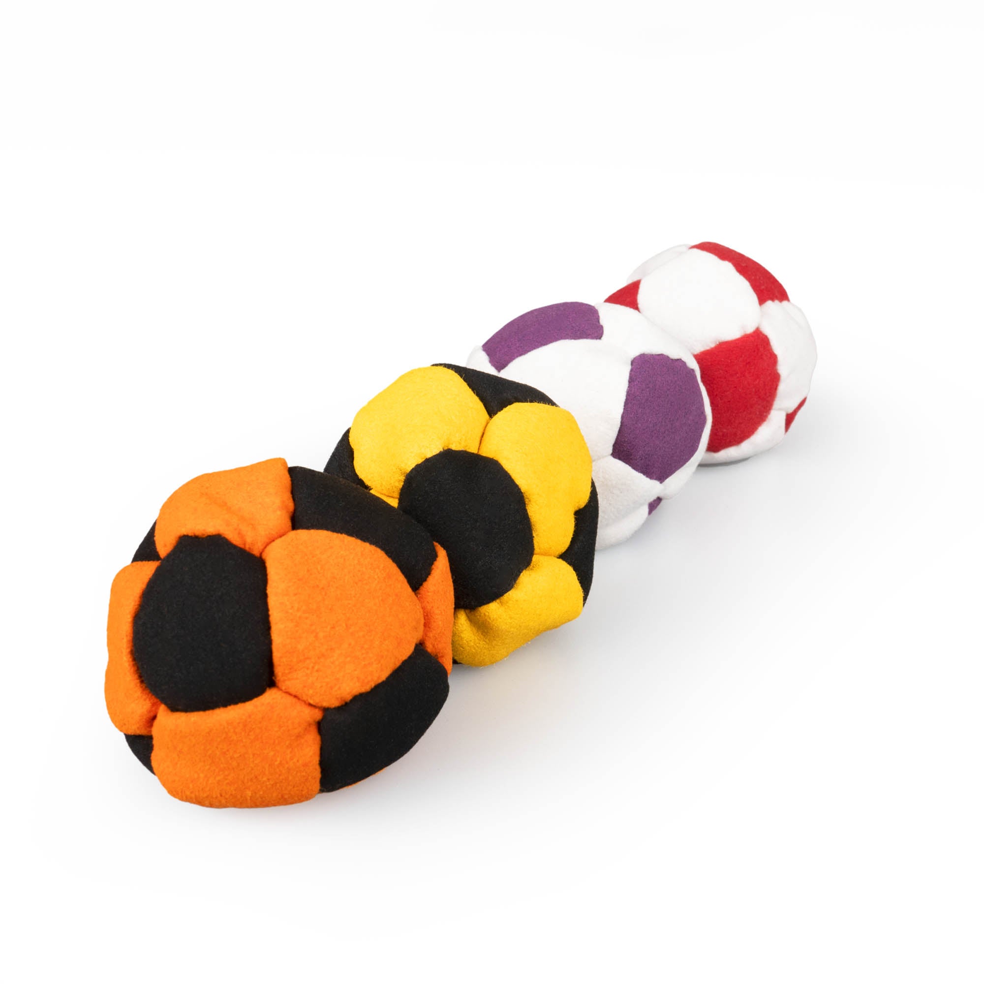 All four color variant firetoys hacky sacks in line