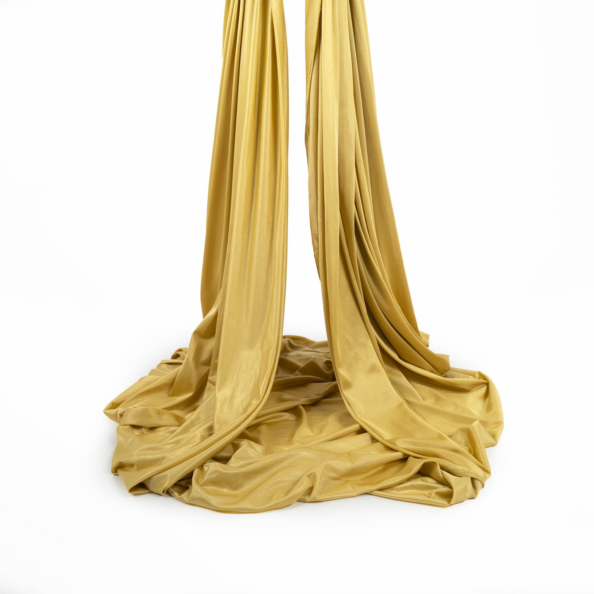 Gold yoga hammock piled up