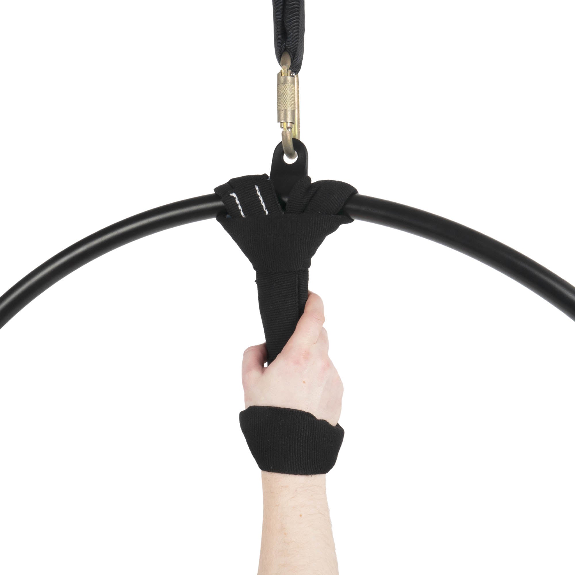 Hand holding a black loop, attached to hoop