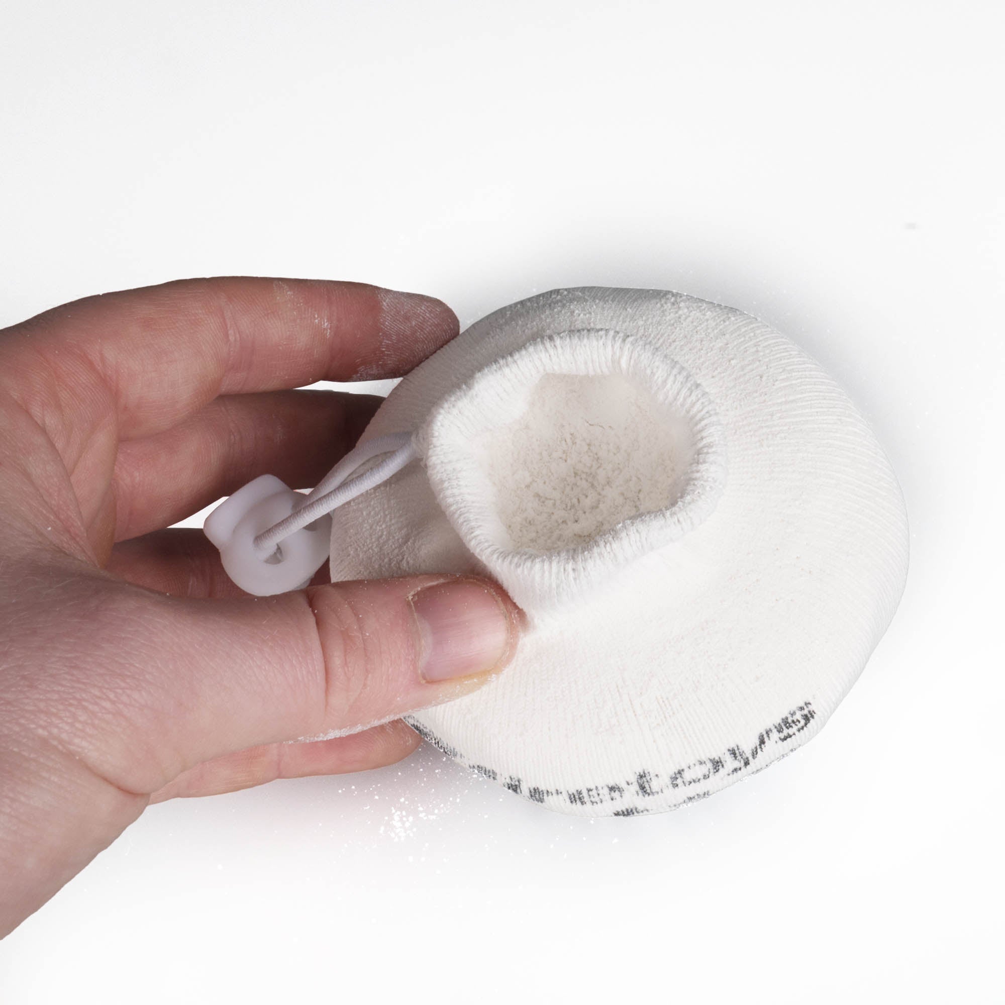 Firetoys Getta Grip Chalk ball, ball open showing chalk inside