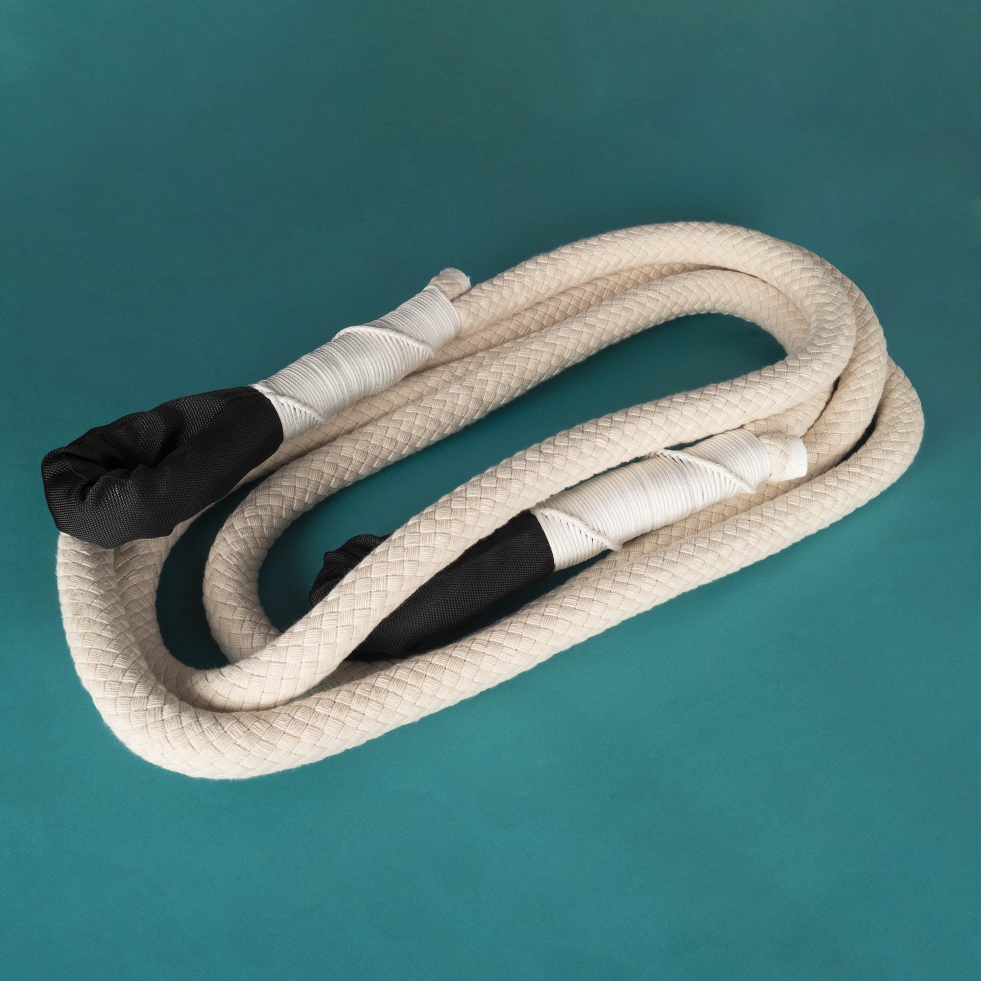 Prodigy braided cloud swing coiled on coloured backgroundProdigy braided cloud swing coiled on coloured background