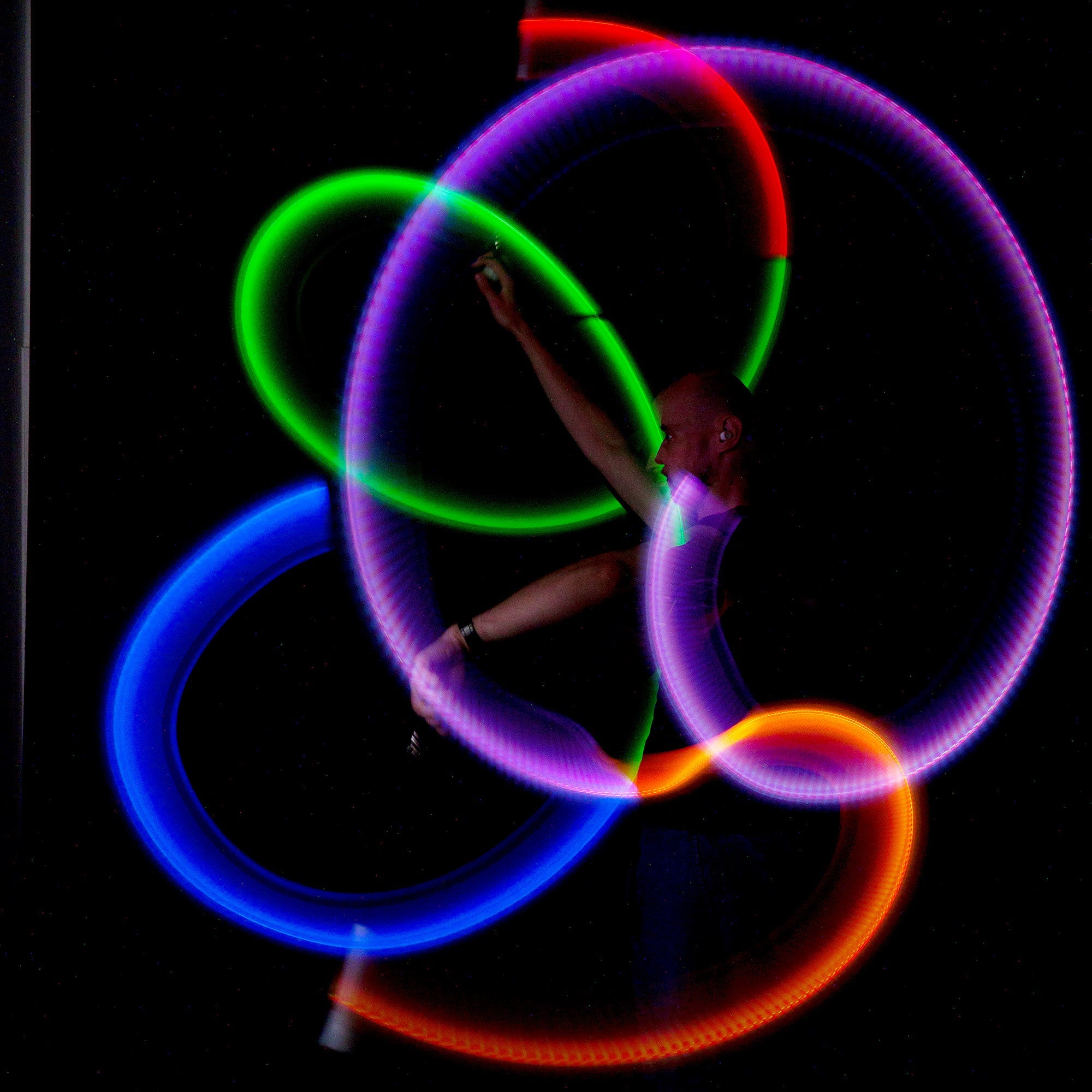 stick poi spinning with light trails
