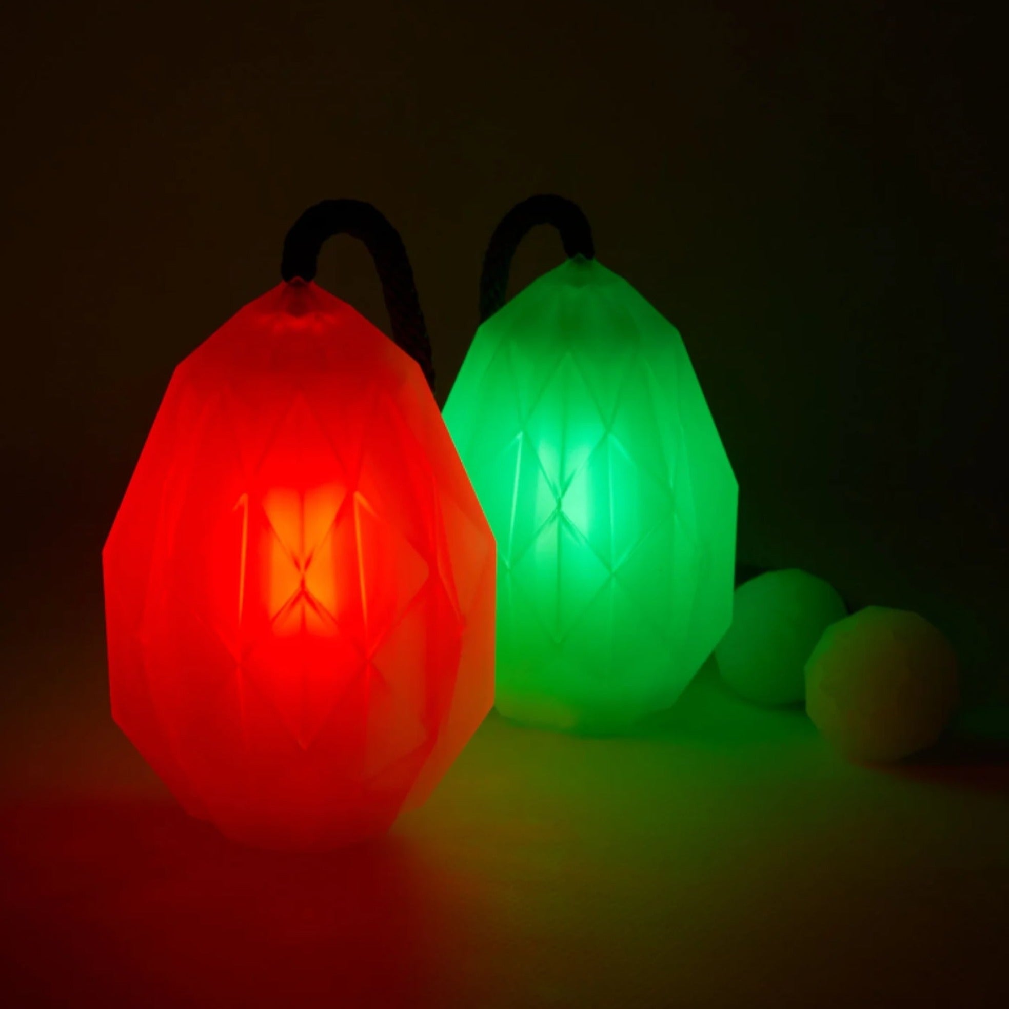 poi glowing, 1 red, 1 green