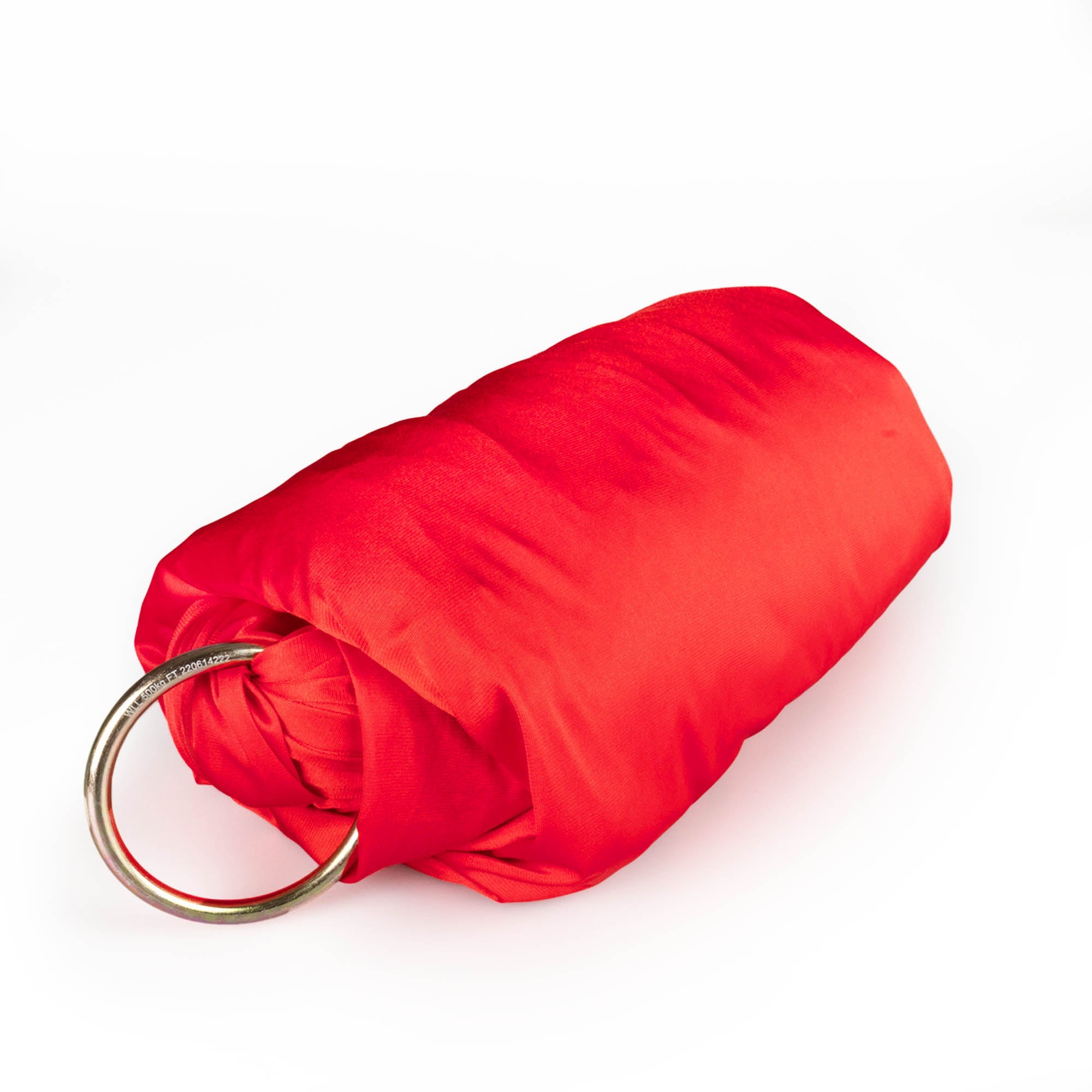 Red yoga hammock rolled up with rings attached