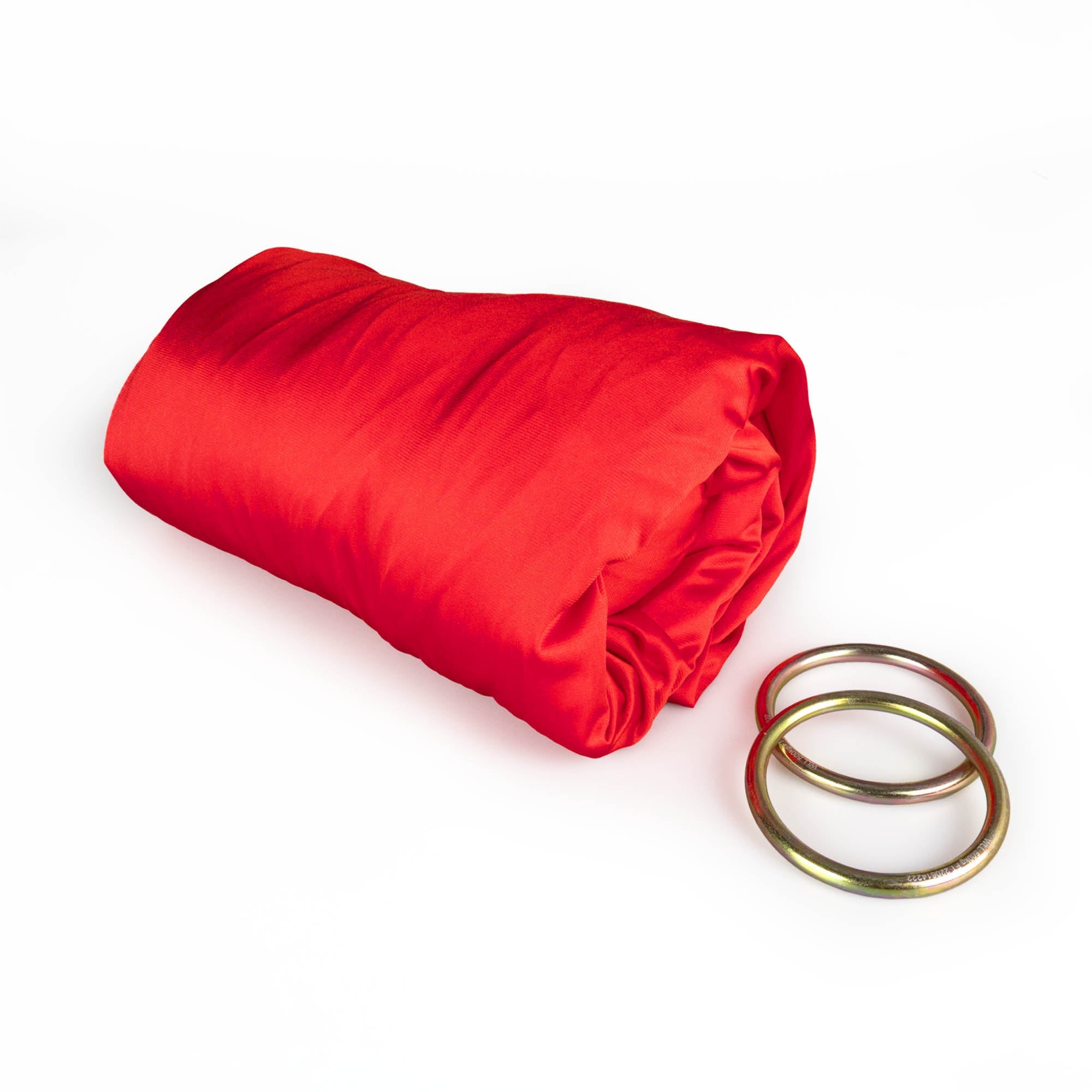 Red yoga hammock rolled up with rings detached