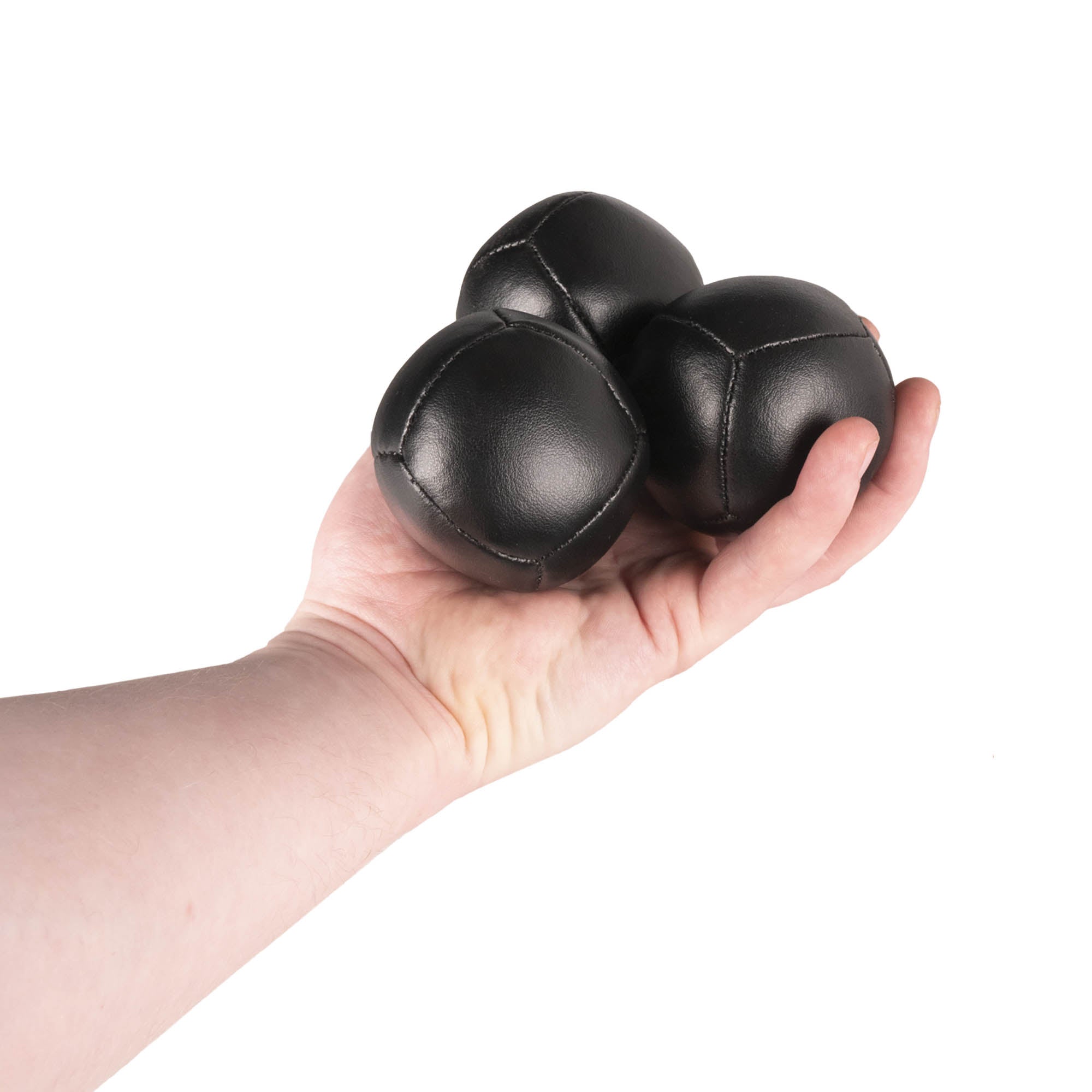 Firetoys three black 110g thud juggling balls in hand