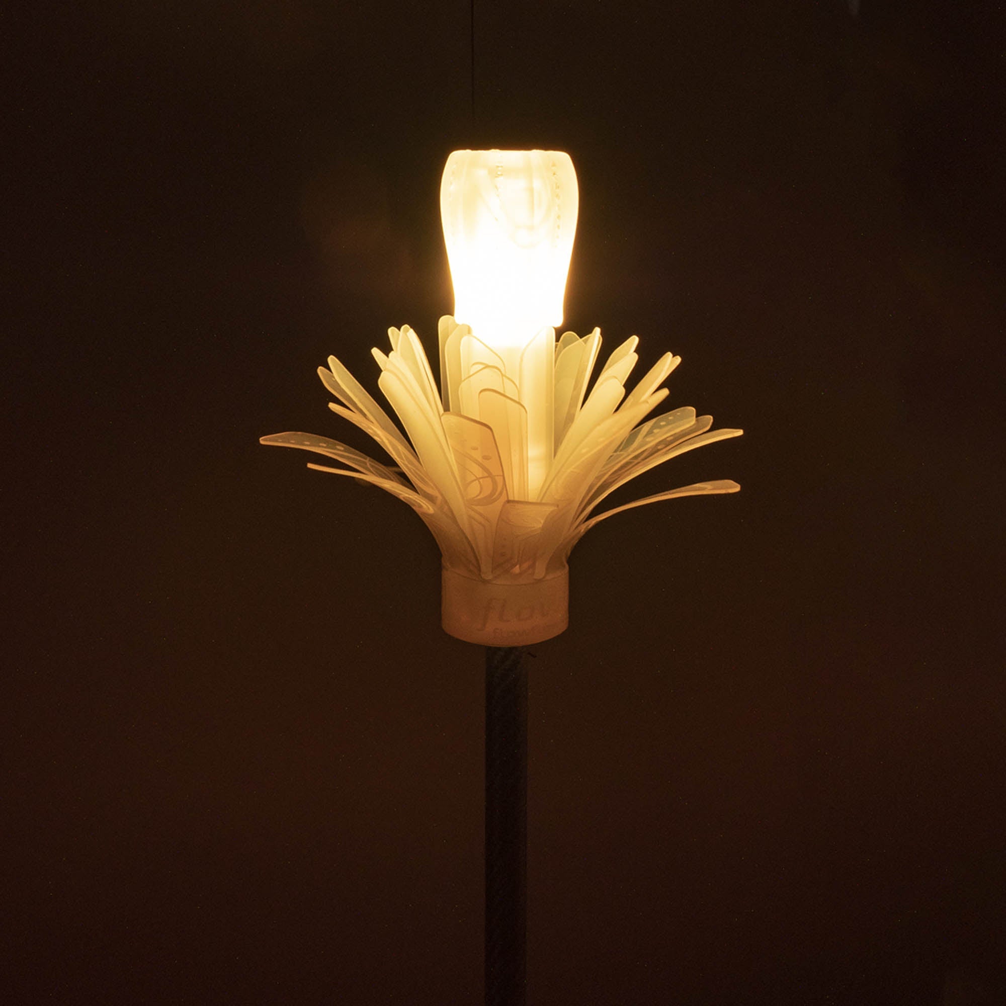 Flowtoys Composite LED Glow Flower Stick V2 glowing orange close up