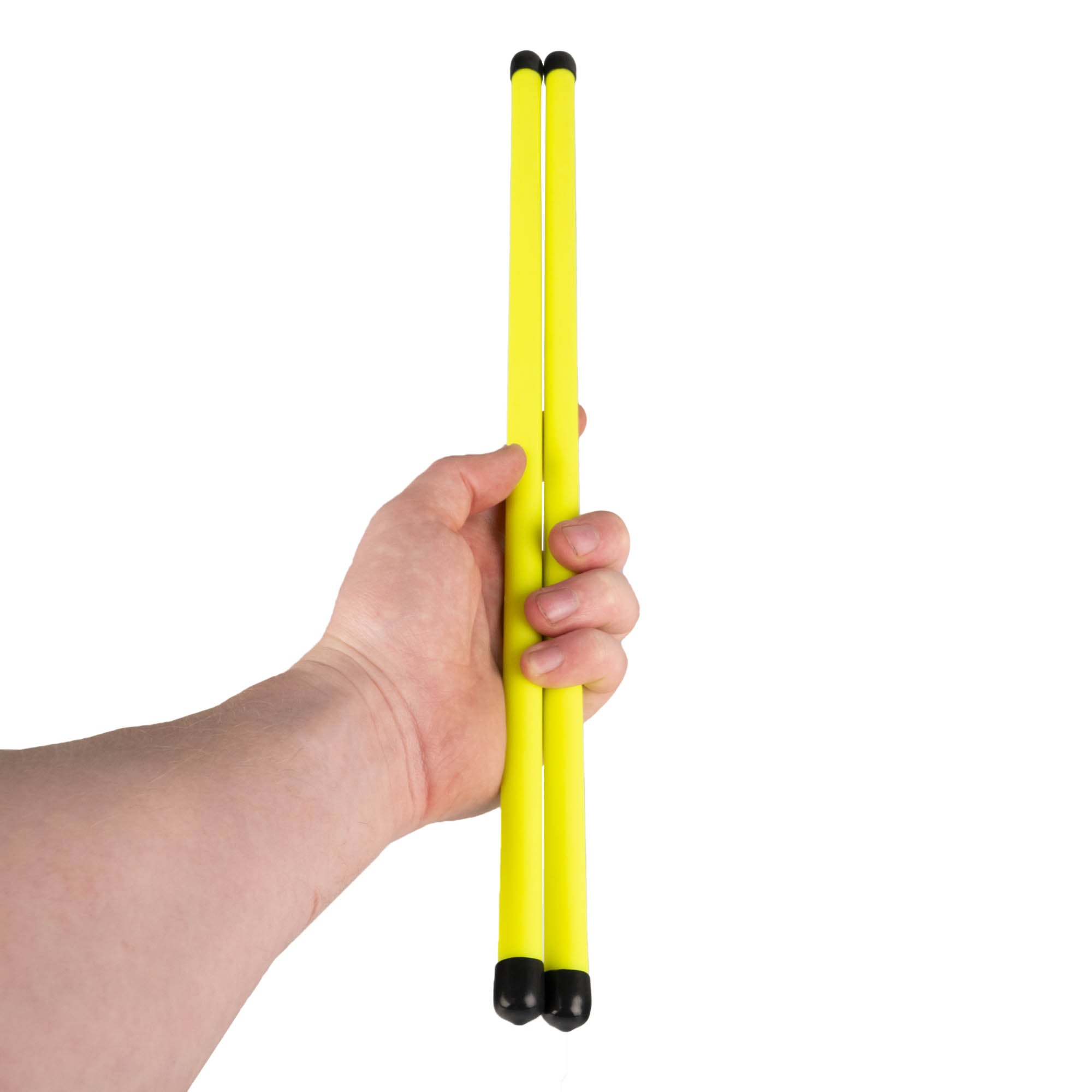 Pair of UV yellow devilstick handsticks in hand