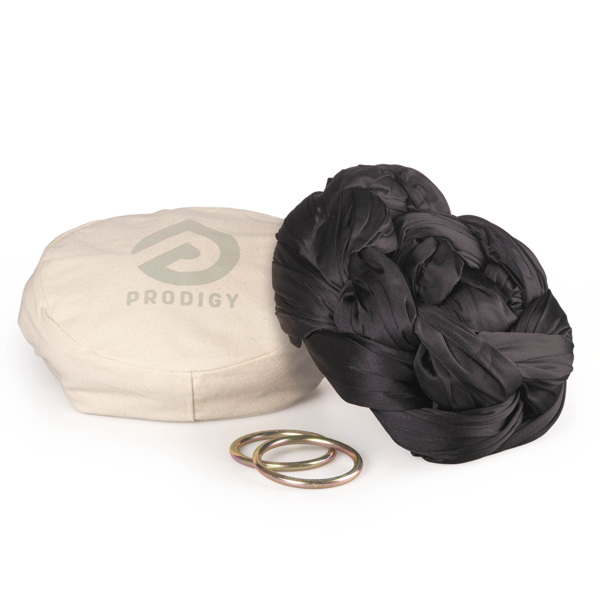 Black Aerial Sling resting on eco bag with O-rings laying in front