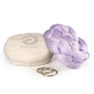 Lilac yoga hammock resting on eco bag with O-rings laying in front