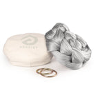 Silver Aerial Sling resting on eco bag with O-rings laying in front