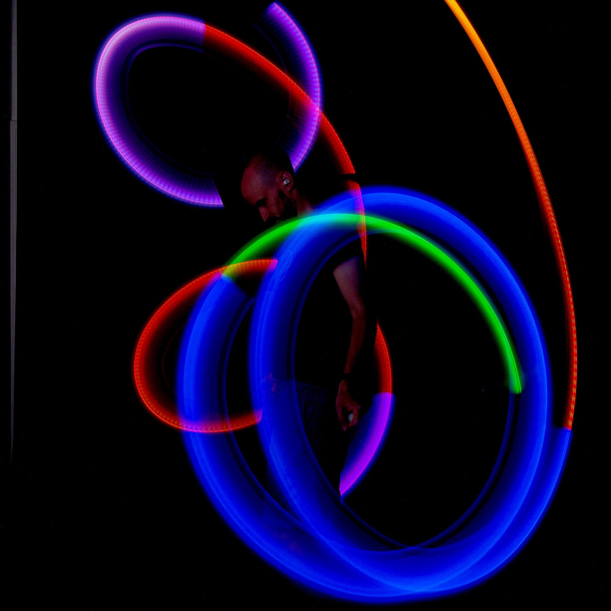 stick poi spinning with light trails