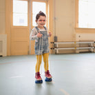 A child using wooden walking bobbins