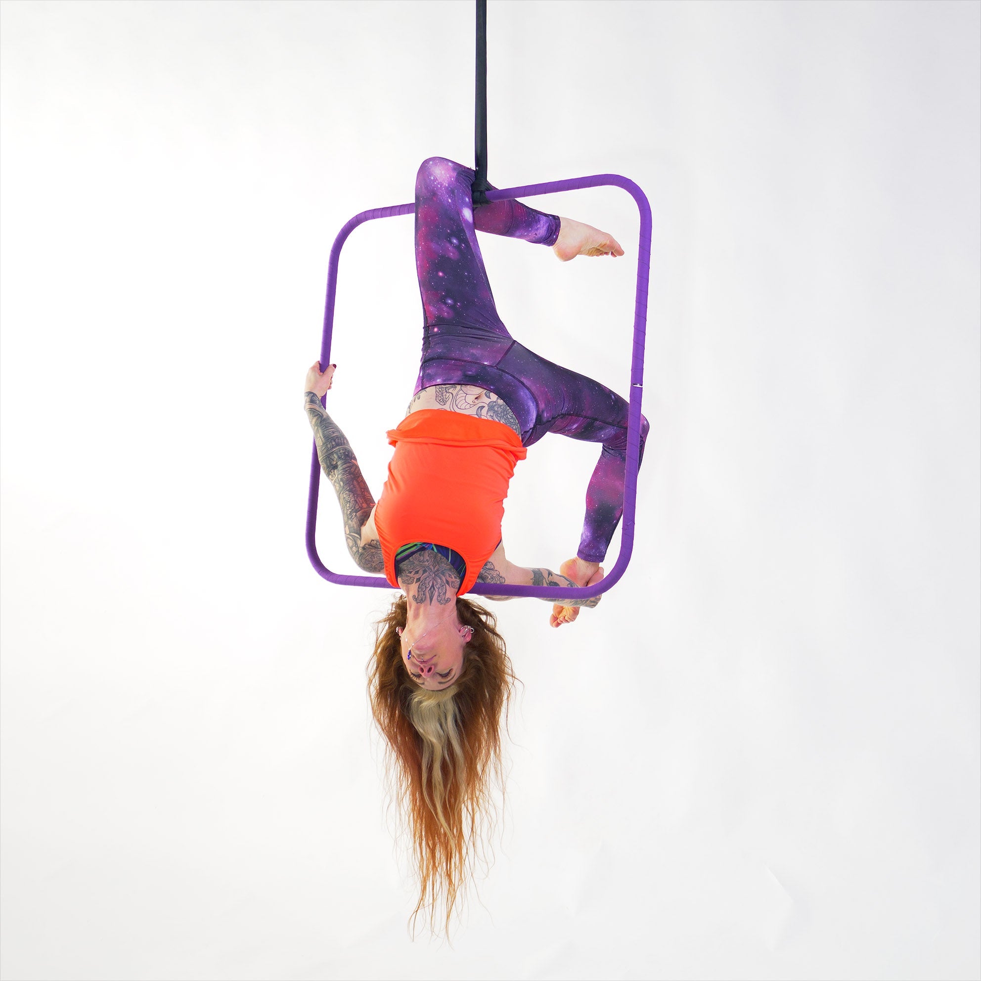 performer in an aerial square